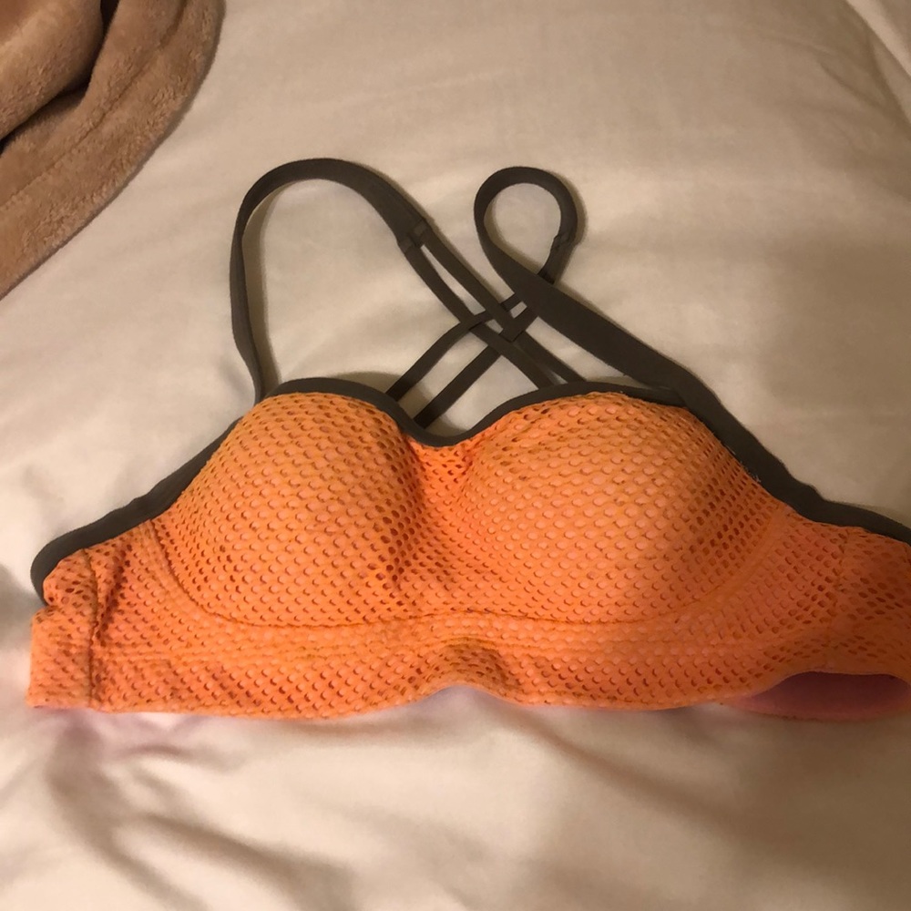 Victoria’s Secret sports bra. Size: Small/32B